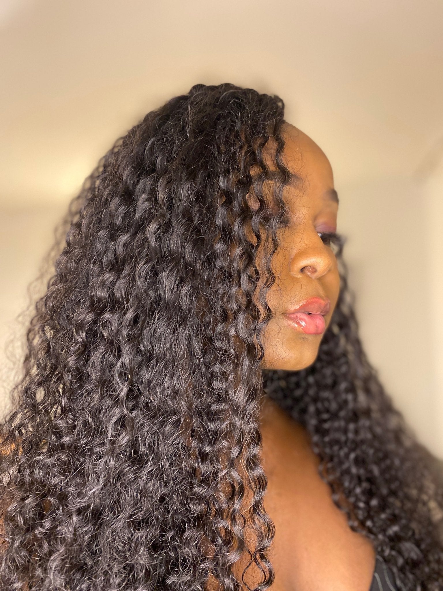 Close-up of reusable 100% human hair crochet extensions in kinky curly texture