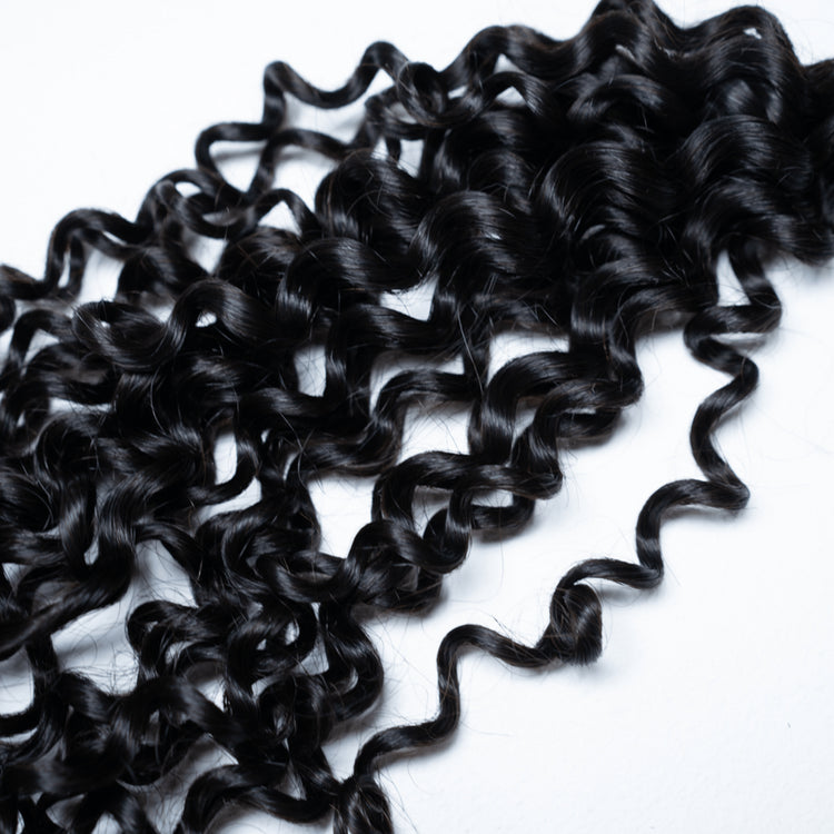 100% Virgin Human Hair Curly Bundles close-up