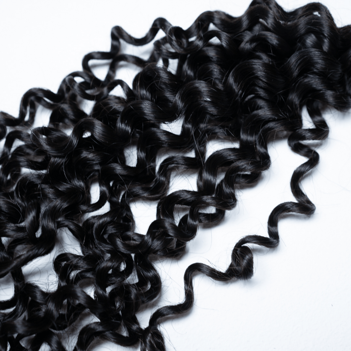 100% Virgin Human Hair Curly Bundles close-up