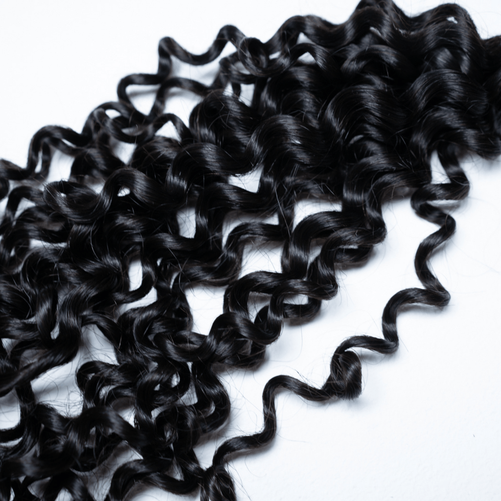 100% Virgin Human Hair Curly Bundles close-up