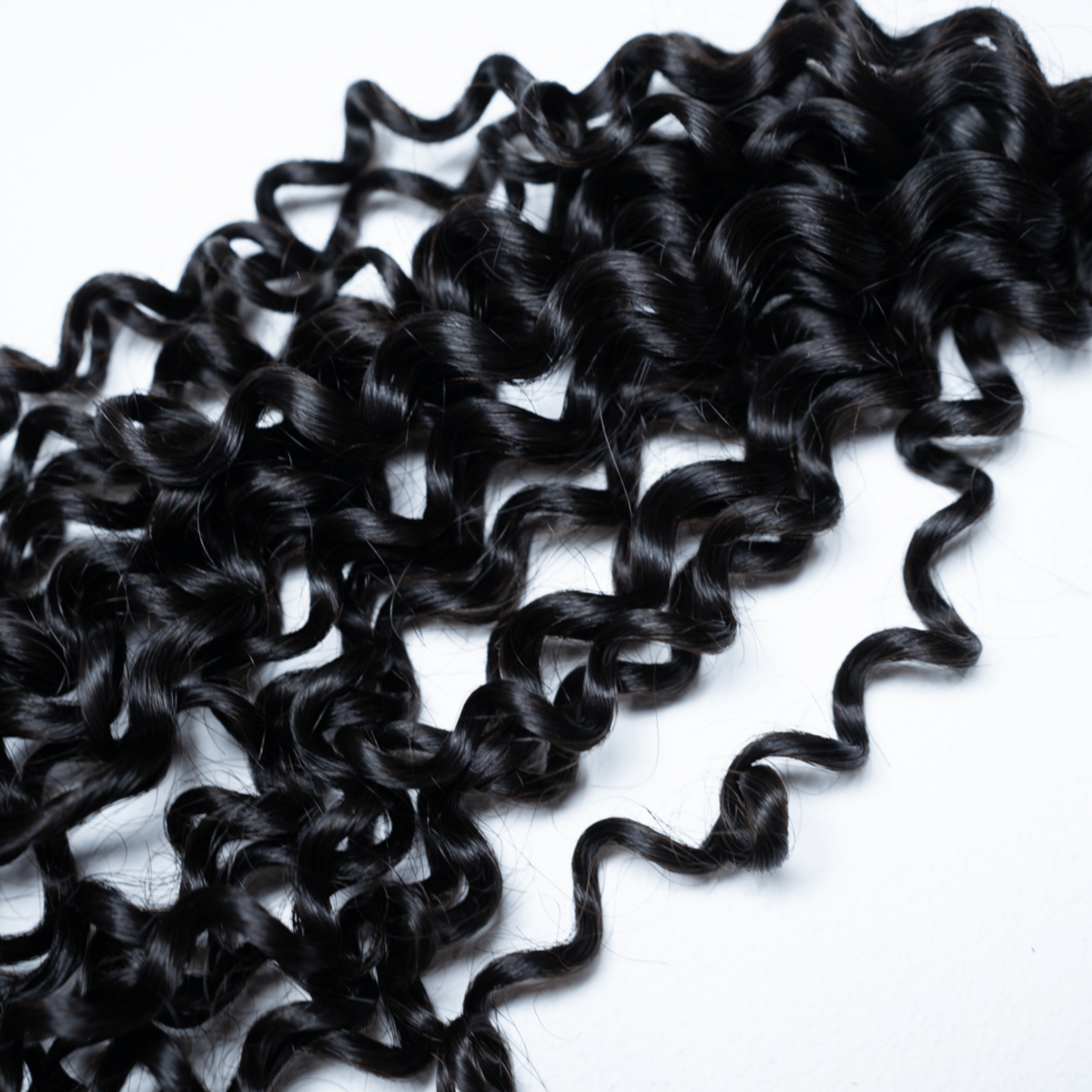 100% Virgin Human Hair Curly Bundles close-up